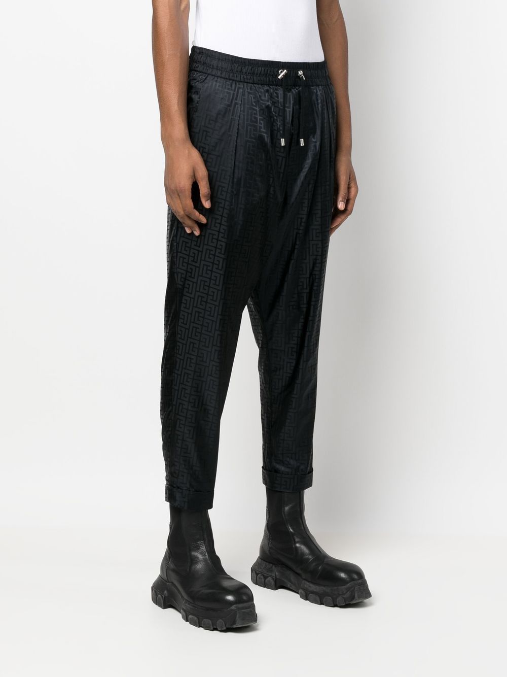 Givenchy monogram-print tapered trousers Women