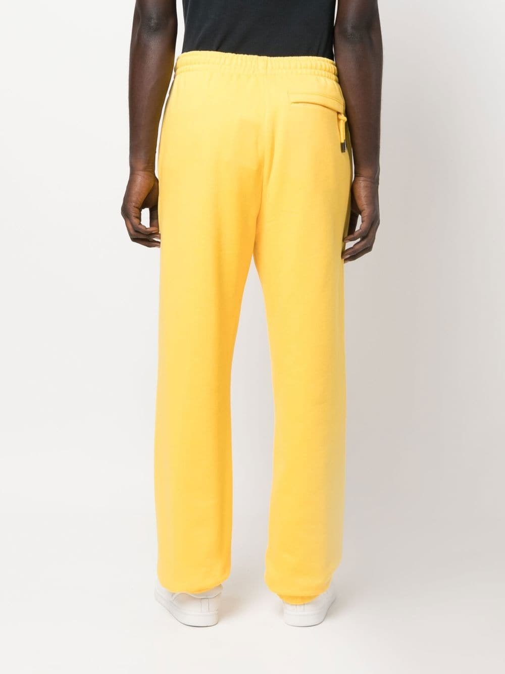 Shop Jacquemus Logo-print Organic Cotton Track Pants In Yellow