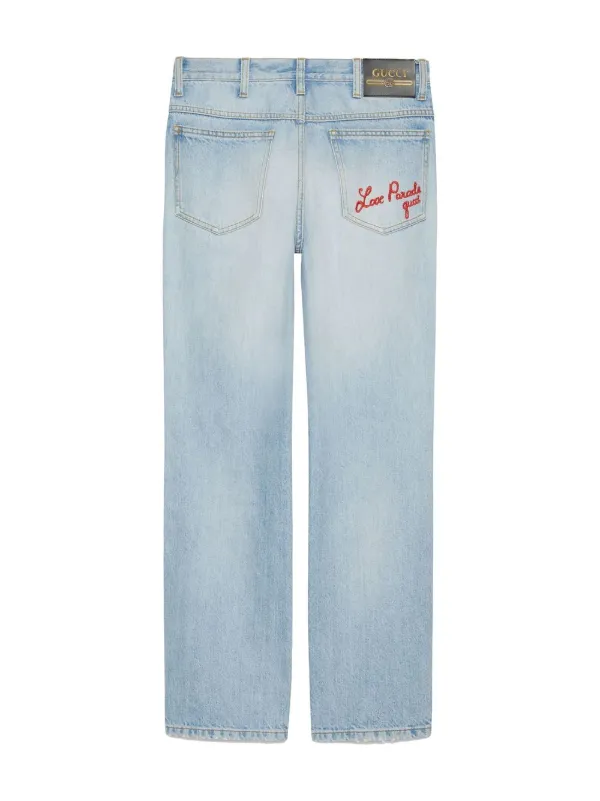 logo-embroidered washed-denim jeans