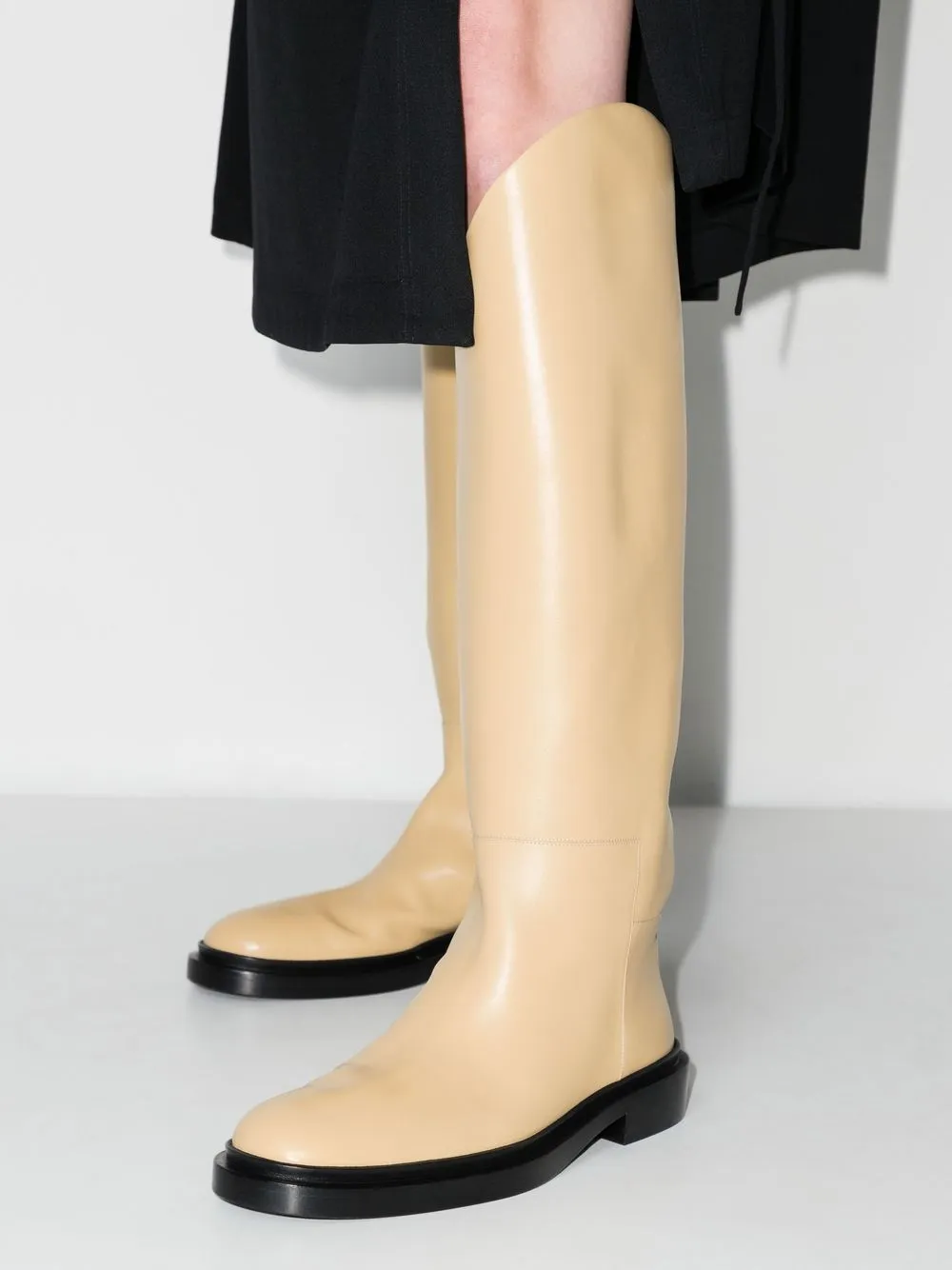 knee-length leather boots