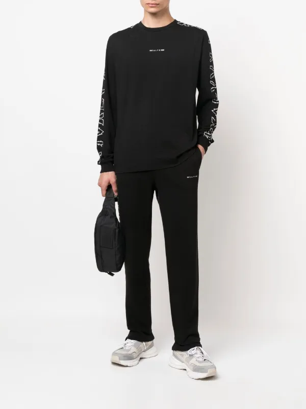 1017 ALYX 9SM ブラック トラックパンツ 1017 ALYX 9SM トラックパンツ | ブラック | FARFETCH JP
