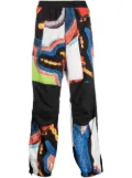 AMBUSH abstract-pattern paneled track pants - Black