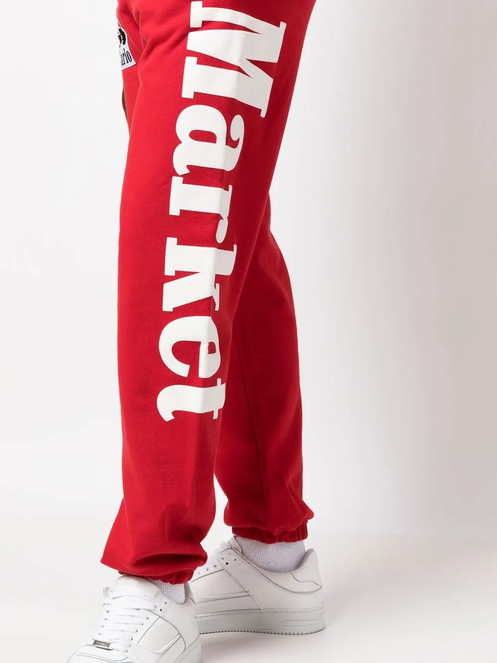 Farfetch Sport & Swimwear Abbigliamento sportivo Pantaloni sportivi Pantaloni sportivi con stampa grafica Rosso 