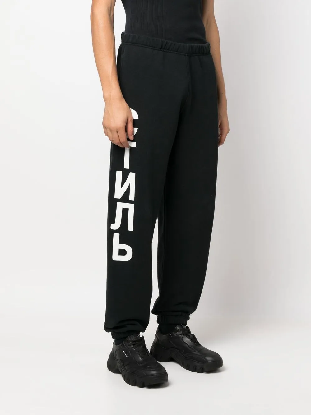Heron Preston CTNMB logo-print track-pants | Black | FARFETCH