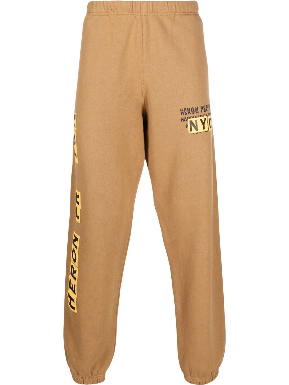 heron preston pantalon de jogging à logo imprimé - marron