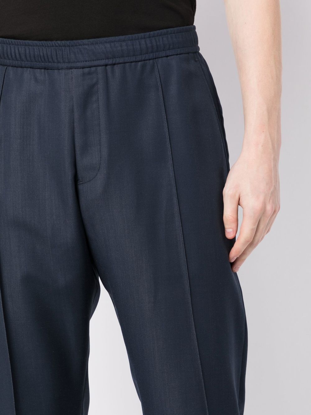 Shop Emporio Armani Elasticated Tapered-leg Trousers In Blue