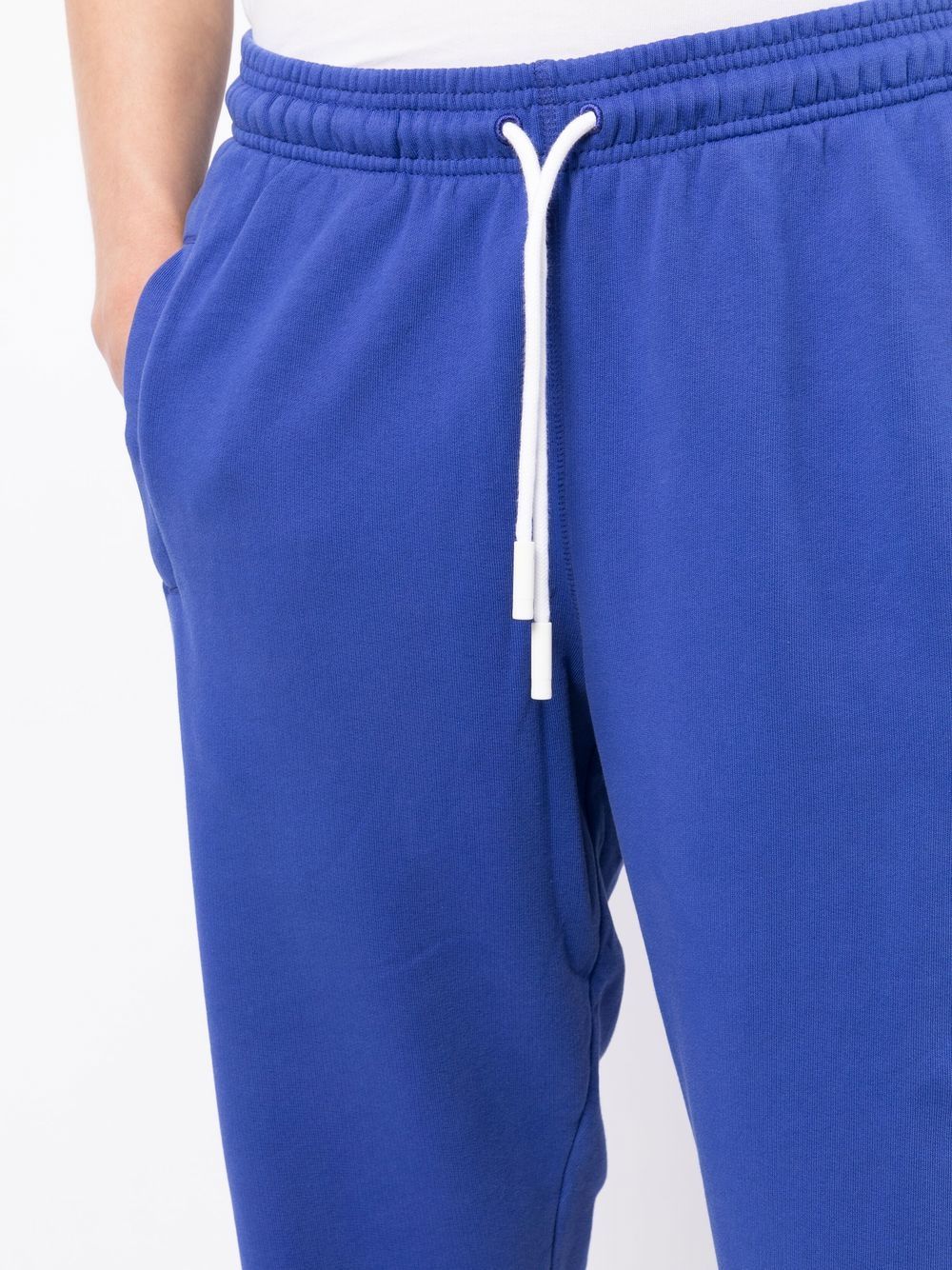 Shop Marcelo Burlon County Of Milan Cross Tapered Track Pants In Blue