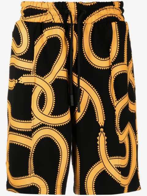 COUNTY OF MILAN Snakes print track shorts