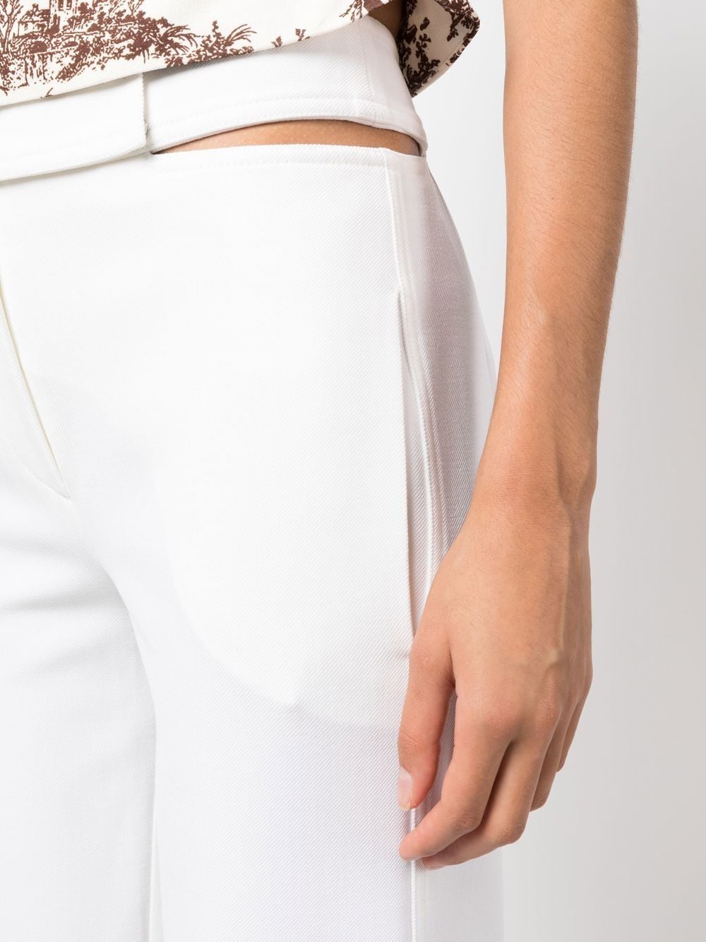 Shop Genny Cut Out-detail Tailored Trousers In White