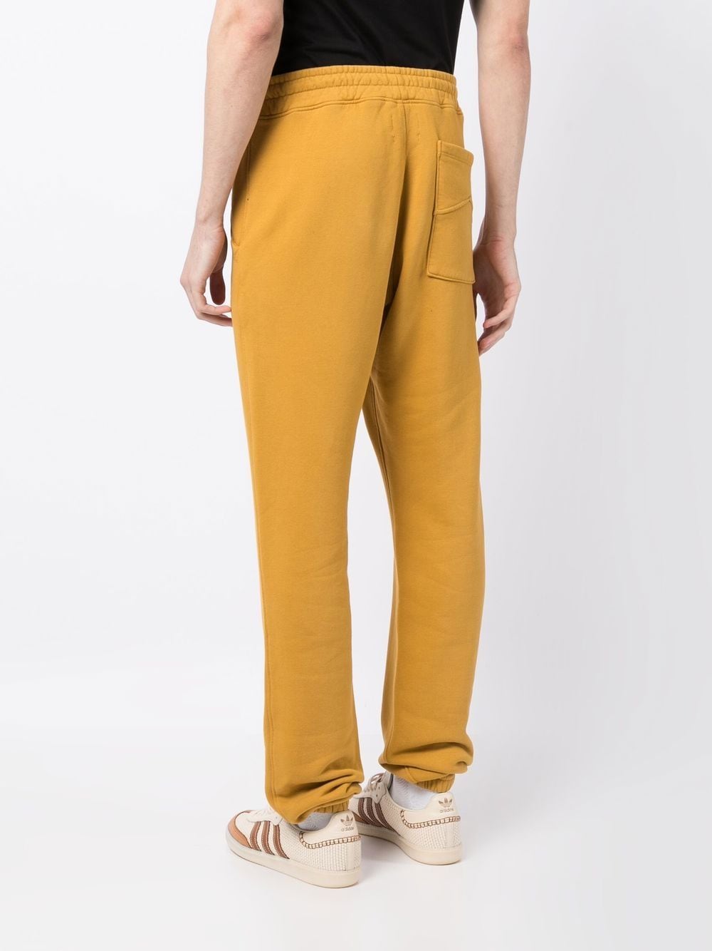 Shop Rhude Embroidered-logo Drawstring Track Pants In Yellow