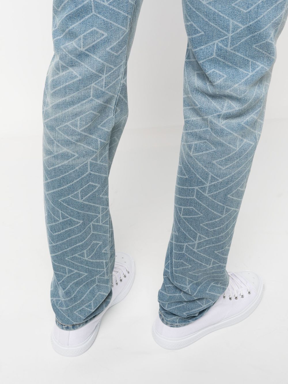 Shop Versace Geometric-print Washed Jeans In Blue