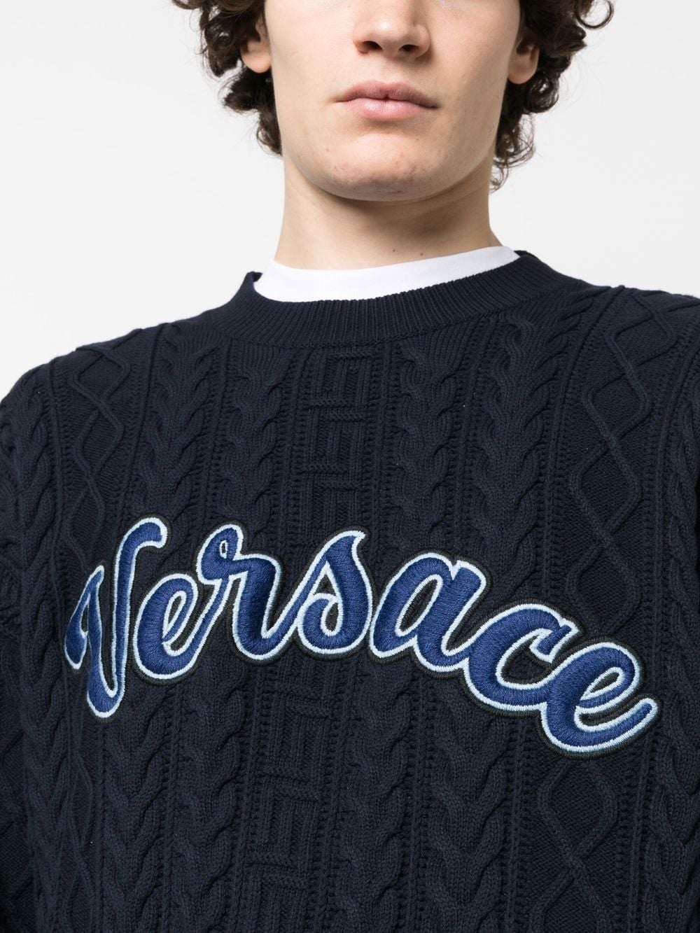 Shop Versace Logo Appliqué Cable-knit Jumper In Blue