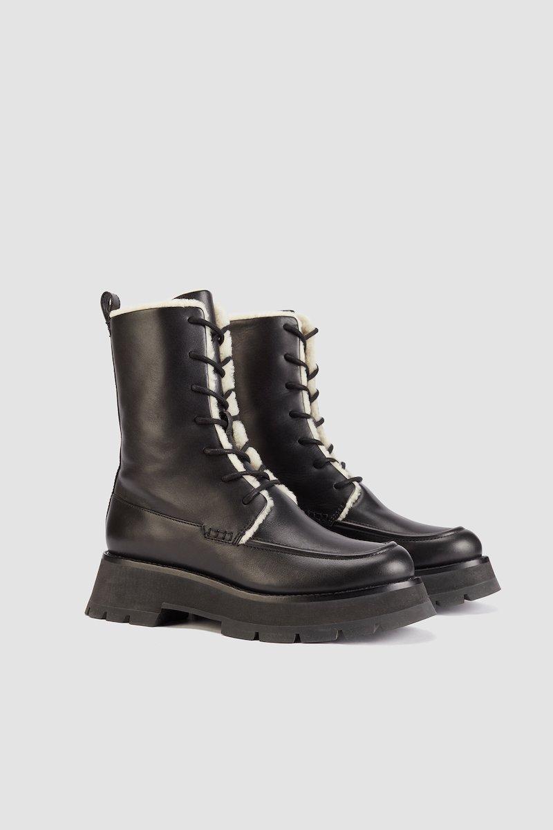 Kate Lace Up Combat Boot With Shearling-black #1 Kate Lace Up Combat Boot With Shearling, lace-up boots from 3.1 PHILLIP LIM featuring black, calf leather, pull-tab at the heel, round toe, front lace-up fastening and chunky rubber sole.- 1
