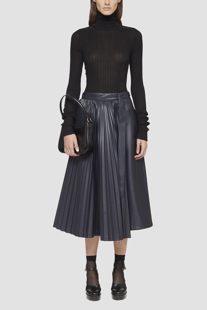Leather Alternative Asymmetrical Pleated Skirt-ink #0 Leather Alternative Asymmetrical Pleated Skirt, asymmetrical-pleat midi skirt from 3.1 PHILLIP LIM featuring black, faux leather, A-line, fully pleated, asymmetric design, high waist, slip pockets to the sides and mid-length.- 0