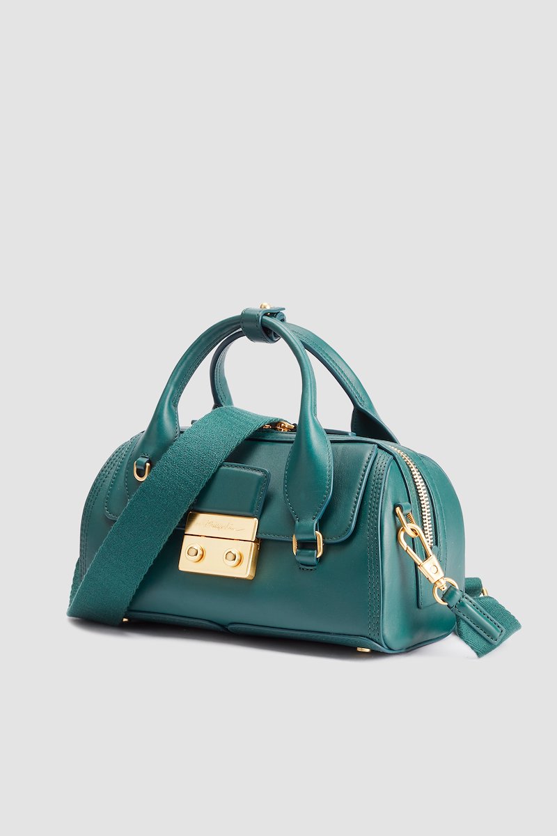 Pashli Duffle-green #1 Pashli Duffle, leather tote bag from 3.1 PHILLIP LIM featuring forest green, calf leather, gold-tone hardware, decorative buckle detail, top zip fastening, two rounded handles to the sides and single shoulder strap.- 1