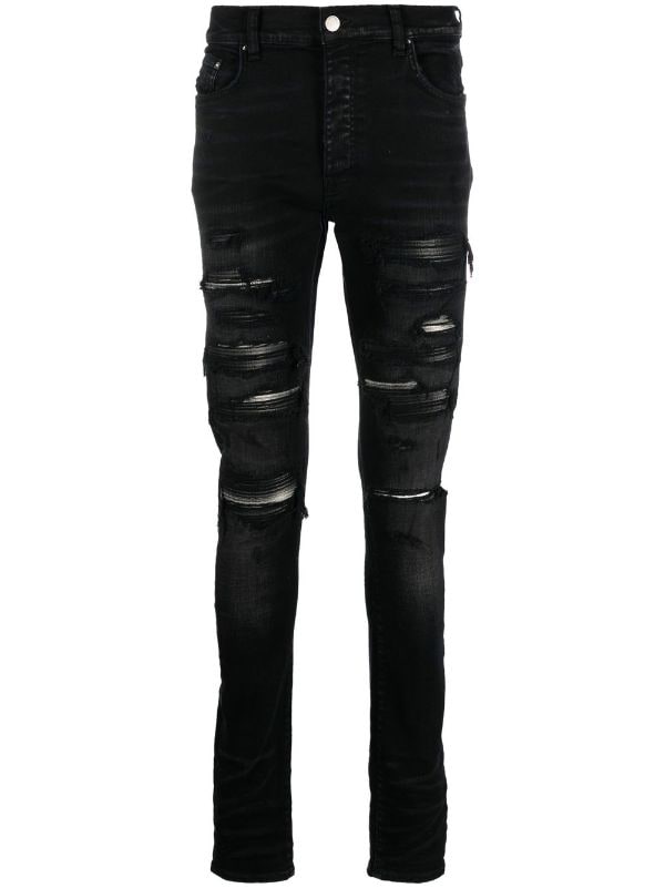 AMIRI Thrasher Distressed Skinny Jeans - Farfetch