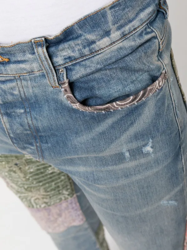 AMIRI Distressed Patchwork Skinny Jeans | Blue | FARFETCH