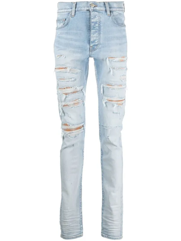 AMIRI Thrasher Distressed Skinny Jeans - Farfetch