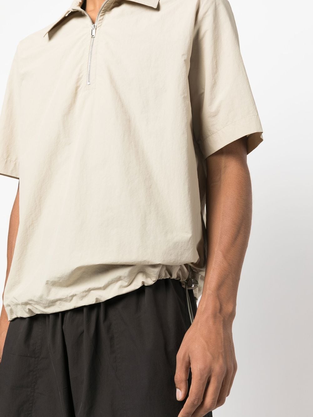 Shop Nanushka Half-zip Short-sleeve Polo Shirt In Neutrals
