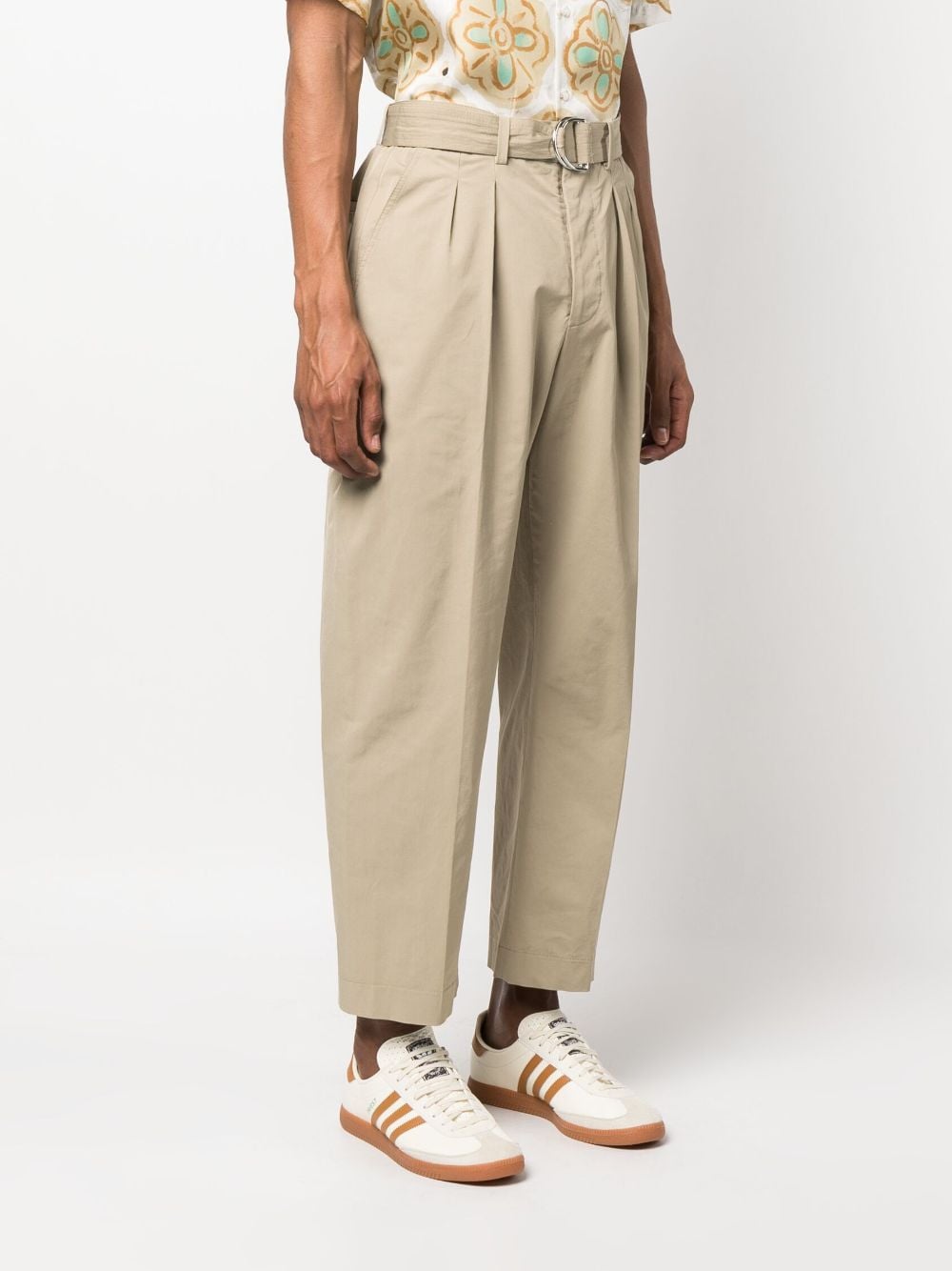 Shop Nanushka Belted Tapered Trousers In Nude