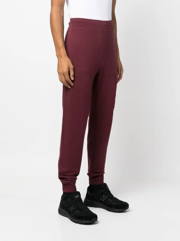 C.P. Company トラックパンツ | レッド | FARFETCH JP