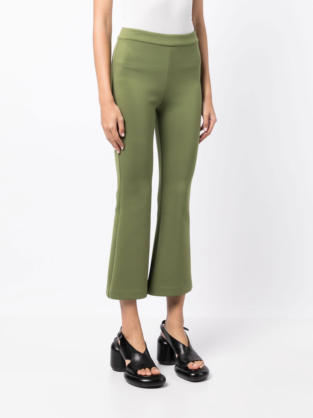 Shop Cynthia Rowley Mid-rise Flared Cropped Trousers In Green