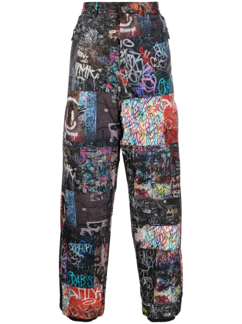 Khrisjoy all-over graphic-print trousers