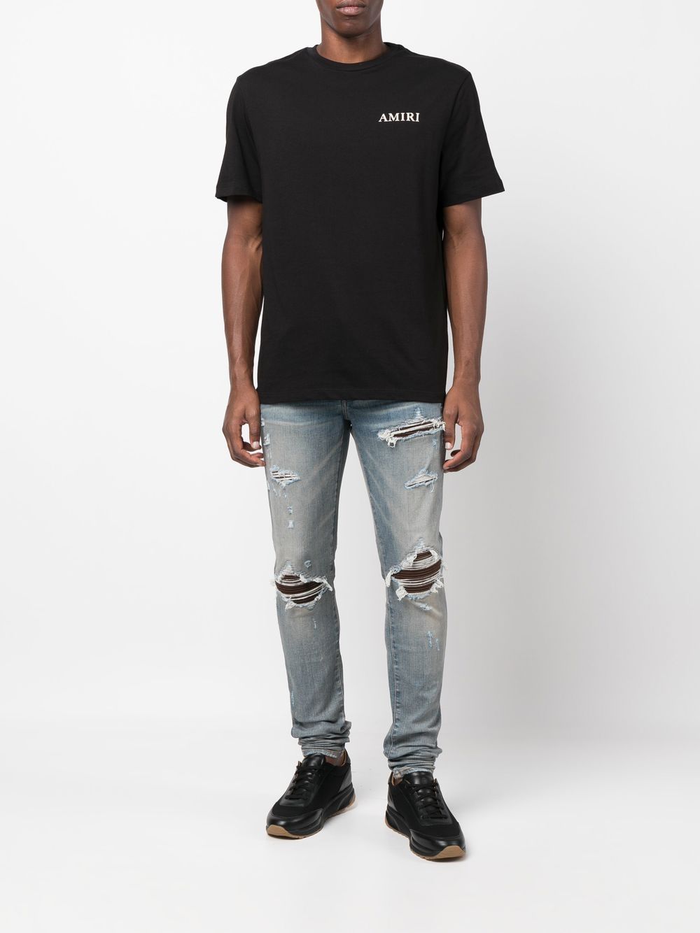 AMIRI Gerafelde jeans - Blauw