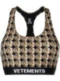 VETEMENTS logo-print racerback sports bra - Black