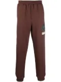 Helmut Lang logo-patch tapered joggers - Brown