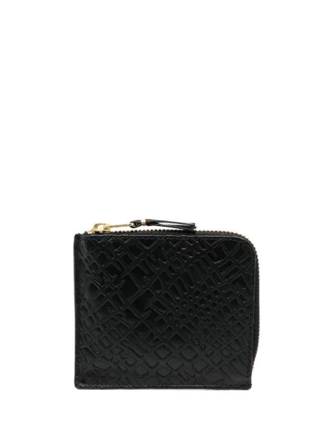 Comme Des Garçons Wallet cartera con logo en relieve y cierre 