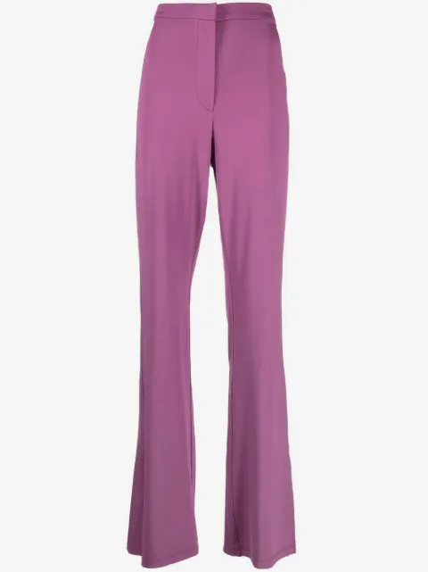 REMAIN pantalones acampanados con abertura en los bajos