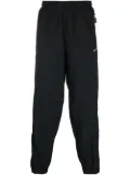 Nike Solo Swoosh track pants - Black