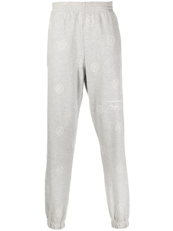 logo pattern track pants