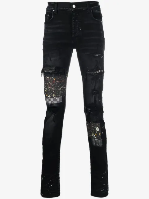 AMIRI 泼漆效果贴花牛仔裤