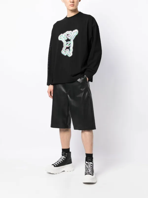 【関税込み】We11done ブラック グラフィック 長袖Tシャツ We11done グラフィック ロングTシャツ | ブラック | FARFETCH JP