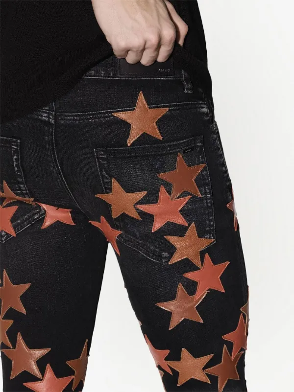 AMIRI スターパッチ ジーンズ | ブラック | FARFETCH JP