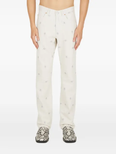 Martine Rose Calça jeans com bordado floral