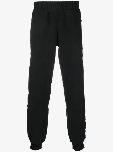 The North Face pantalones de chándal con motivo gráfico y paneles