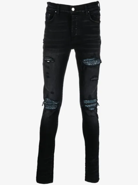 AMIRI distressed skinny jeans