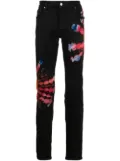 AMIRI tie-dye print skinny jeans - Black