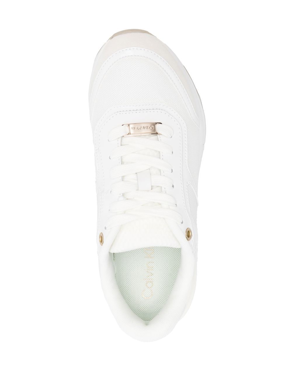 Shop Calvin Klein Embossed Logo Low-top Sneakers In White