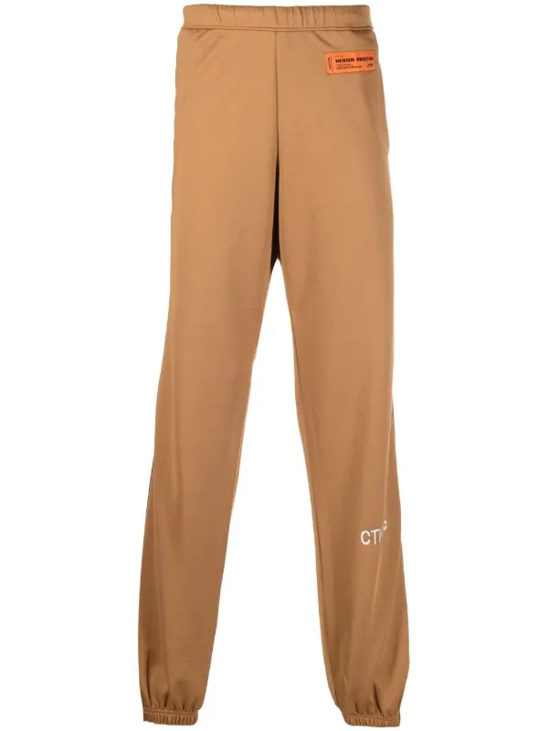 Heron Preston トラックパンツ | ブラウン | FARFETCH JP