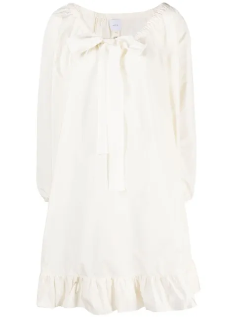 Patou vestido con moño en el cuello y volantes