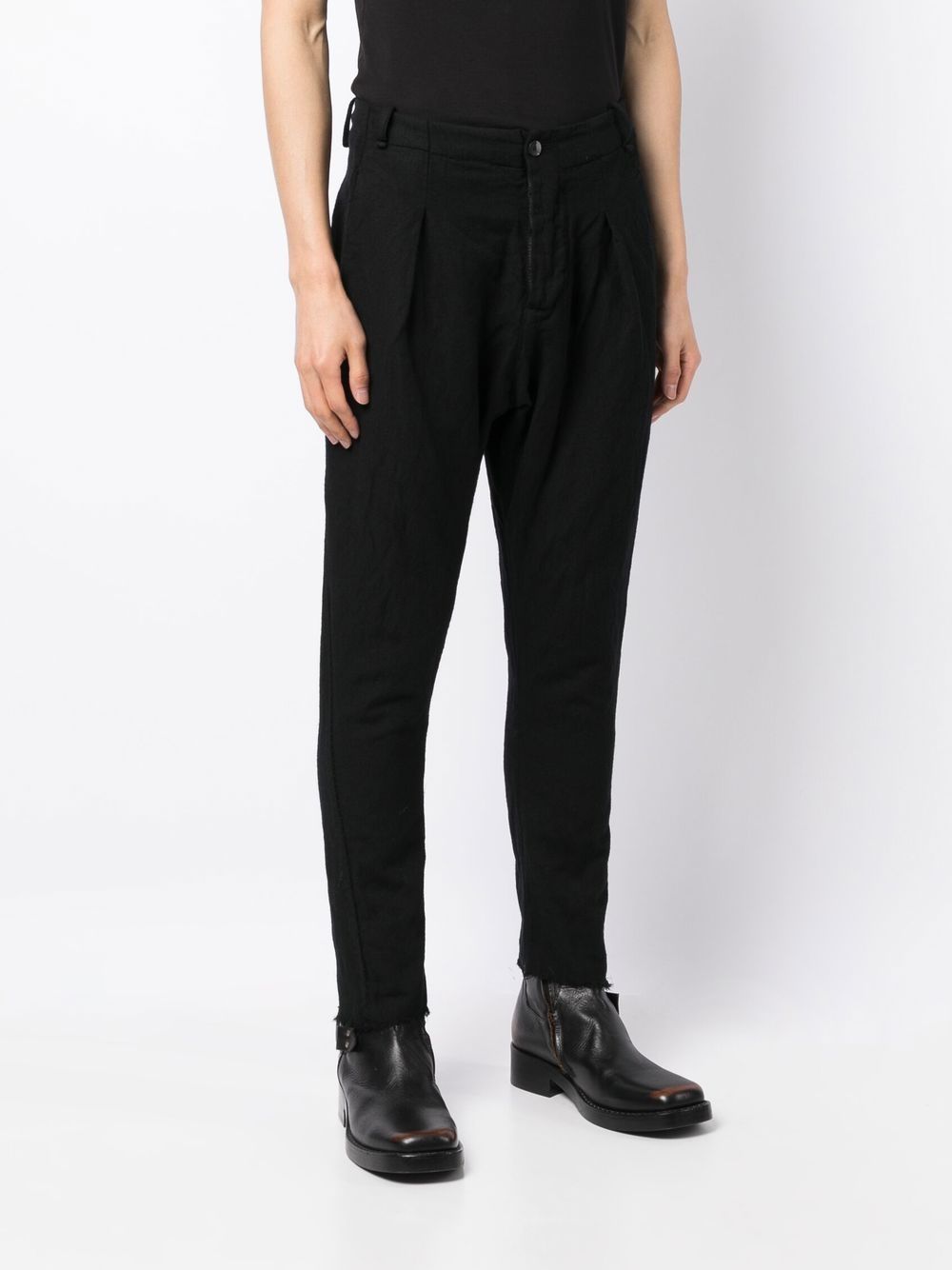 Shop Masnada Tapered-leg Frayed-hem Trousers In Black
