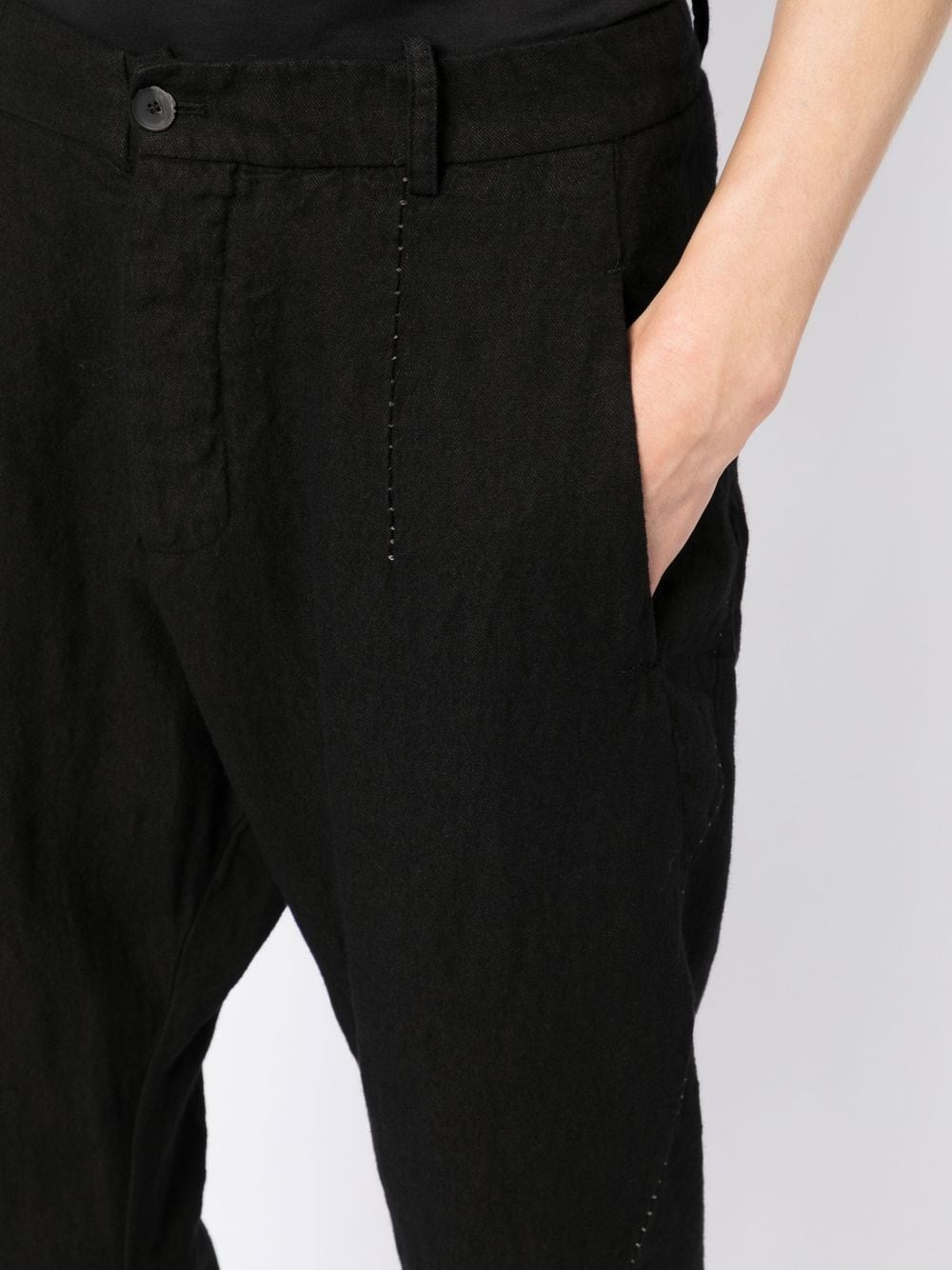 Shop Masnada Tapered-leg Frayed-hem Trousers In 黑色