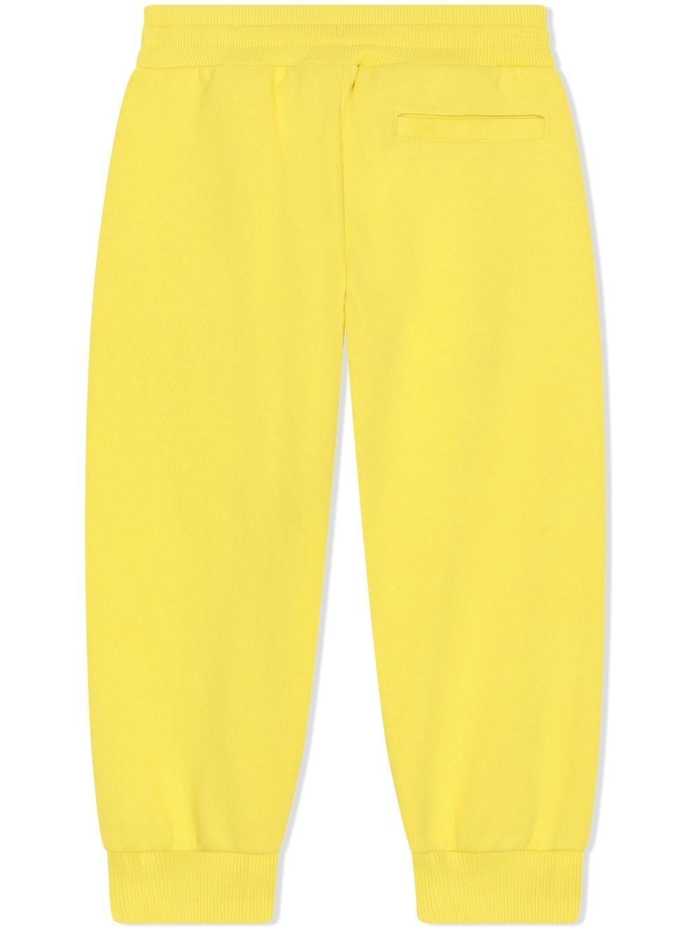 Shop Dolce & Gabbana Drawstring Logo-embroidered Joggers In Yellow