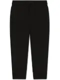 Dolce & Gabbana Kids logo-tag track pants - Black