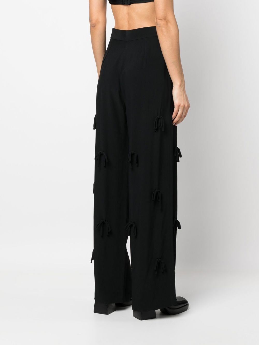 Shop Viktor & Rolf Bed Of Bows Wide Trousers In Black