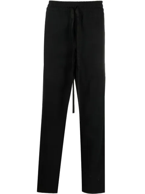 RHUDE pants con rayas laterales